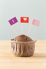 Image showing Chocolate muffins with small flag of I Love you