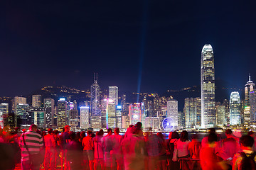 Image showing Many people watching the light show in Hong Kong at night