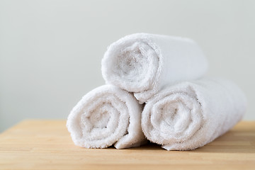 Image showing Roll of white towel for spa