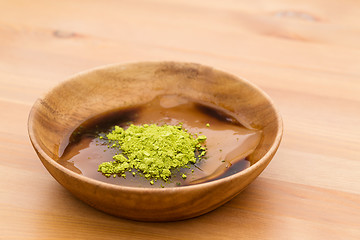 Image showing Japanese confectionery with green tea powder and black sugar sau