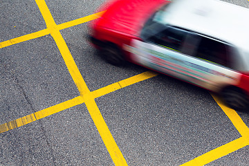 Image showing Motion blurred Taxis in Hong Kong