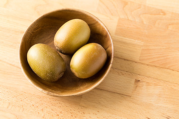 Image showing Three gold kiwi 