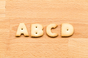 Image showing Letter ABCD cookie over the wooden background