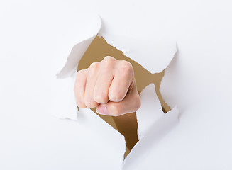 Image showing Punch break through the paper wall