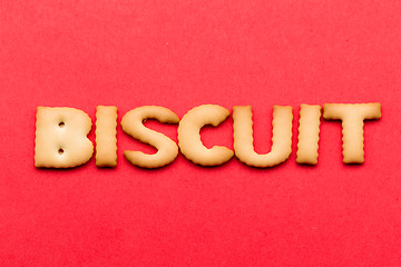 Image showing Word Biscuit over the red background