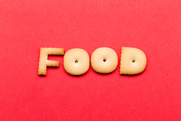 Image showing Food biscuit over the red background