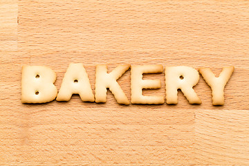 Image showing Word bakery biscuit over the wooden background