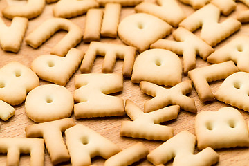 Image showing Baked text cookie over the wooden table