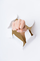 Image showing Fist coming out the paper hole