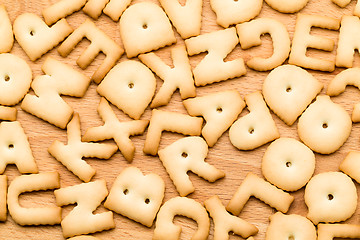 Image showing Baked word cookie over wooden table