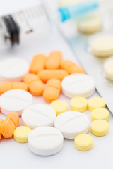 Image showing Syringe with pills drug