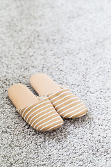 Image showing Slippers on mat