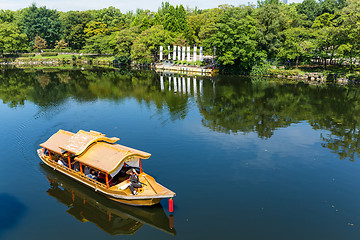 Image showing Tourism boat on the river in Osaka