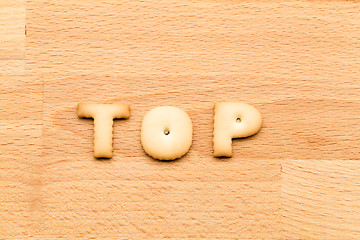 Image showing Word top cookie over the wooden background