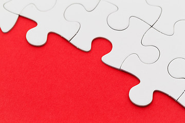 Image showing Missing jigsaw puzzle piece with light glow