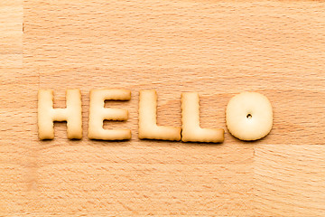Image showing Word hello cookie over the wooden background