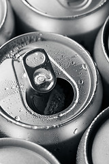 Image showing Opened and closed canned drinks