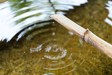 Image showing Bamboo fountain with water wave