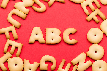 Image showing ABC cookie over the red background