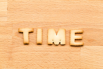 Image showing Word time cookie over the wooden background