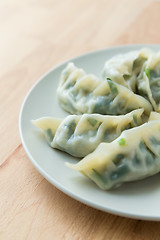 Image showing Chinese meat dumpling on the white plate