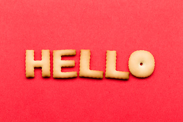 Image showing Word hello cookie over the red background