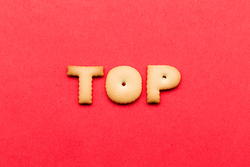 Image showing Word top cookies over the red background