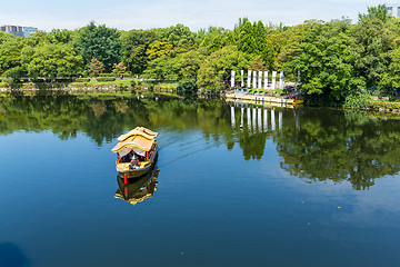 Image showing Tourism boat on river in park
