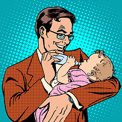 Image showing Happy father feeding newborn baby with milk