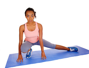 Image showing Beautiful African American woman stretching.