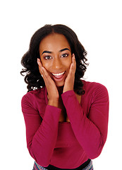 Image showing African woman with hands on face.