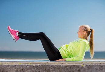 Image showing woman doing sports outdoors