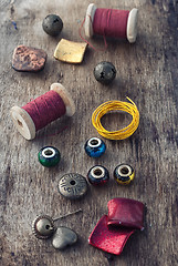 Image showing Floss and trinkets for needlework