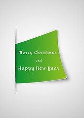 Image showing merry christmas card inserted into paper