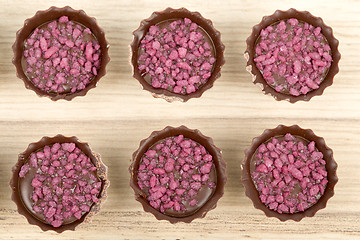 Image showing small chocolate candy cakes 