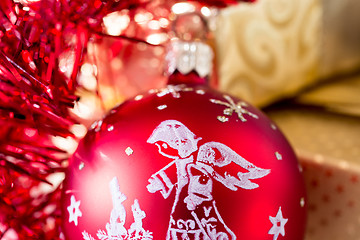 Image showing christmas decoration and golden box with ribbon