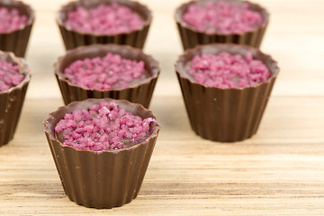 Image showing small chocolate candy cakes 