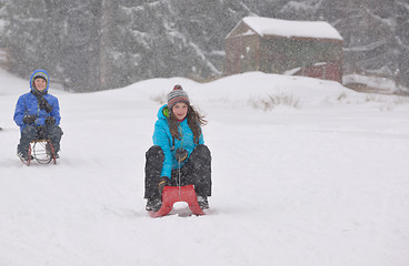 Image showing Kids sliding 