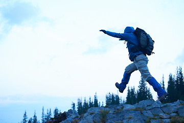 Image showing advanture man with backpack hiking