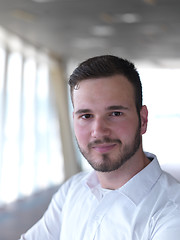 Image showing portrait of young  business man with beard at modern office