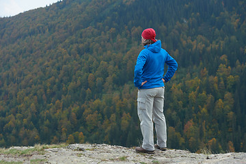 Image showing advanture man with backpack hiking