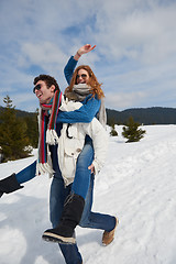 Image showing happy young couple having fun on fresh show on winter vacation