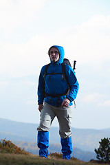 Image showing advanture man with backpack hiking