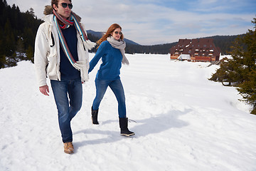 Image showing happy young couple having fun on fresh show on winter vacation