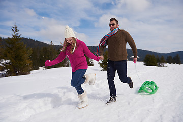 Image showing happy young couple having fun on fresh show on winter vacation