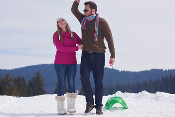 Image showing happy young couple having fun on fresh show on winter vacation