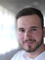 Image showing portrait of young  business man with beard at modern office