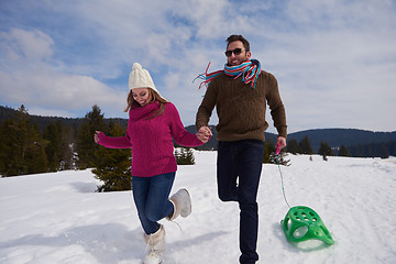 Image showing happy young couple having fun on fresh show on winter vacation