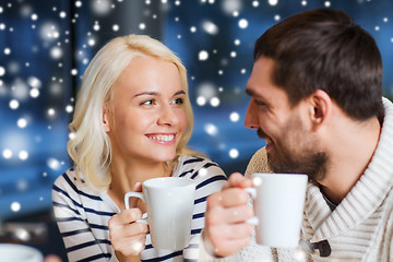 Image showing happy couple meeting and drinking tea or coffee