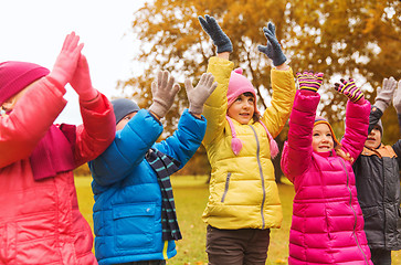 Image showing group of happy children having fun in autumn park